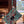 Load image into Gallery viewer, DOU J M CLUTCH LACA BRN FLOWER ON TIFFANY
